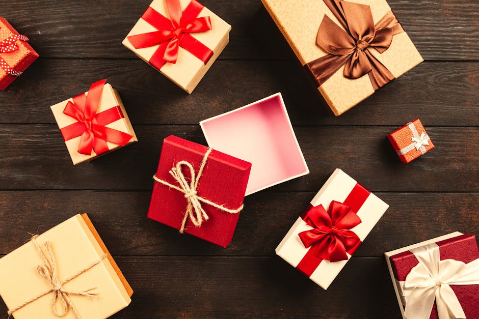 A selection of beautifully wrapped summer gifts for women including perfume, accessories and beauty products