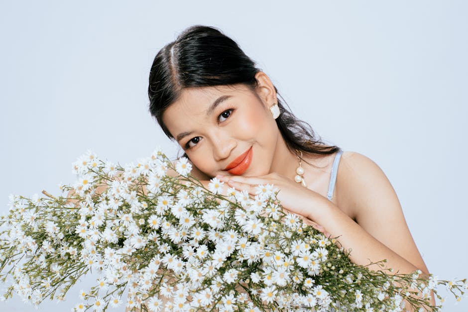 Woman with glowing, healthy skin after using after-sun skincare products
