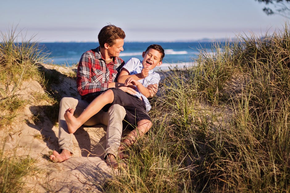 Father and son enjoying a sunny summer day, celebrating Father's Day 2026