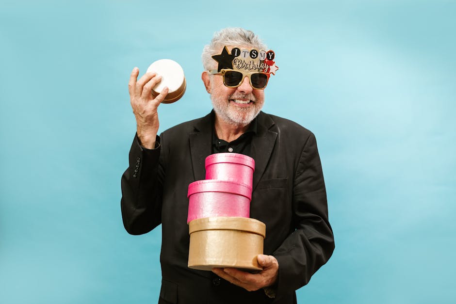 Stylish father unwrapping a luxury gift on Father's Day 2026