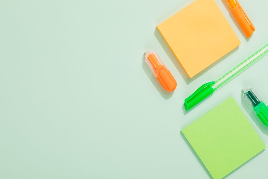 Neatly organised back-to-school supplies and stationery laid out on a desk