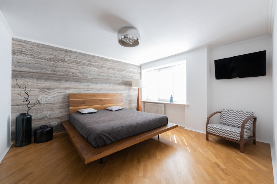 Bright summer bedroom with light linen curtains, wooden furniture and natural accessories for a cool, airy feel
