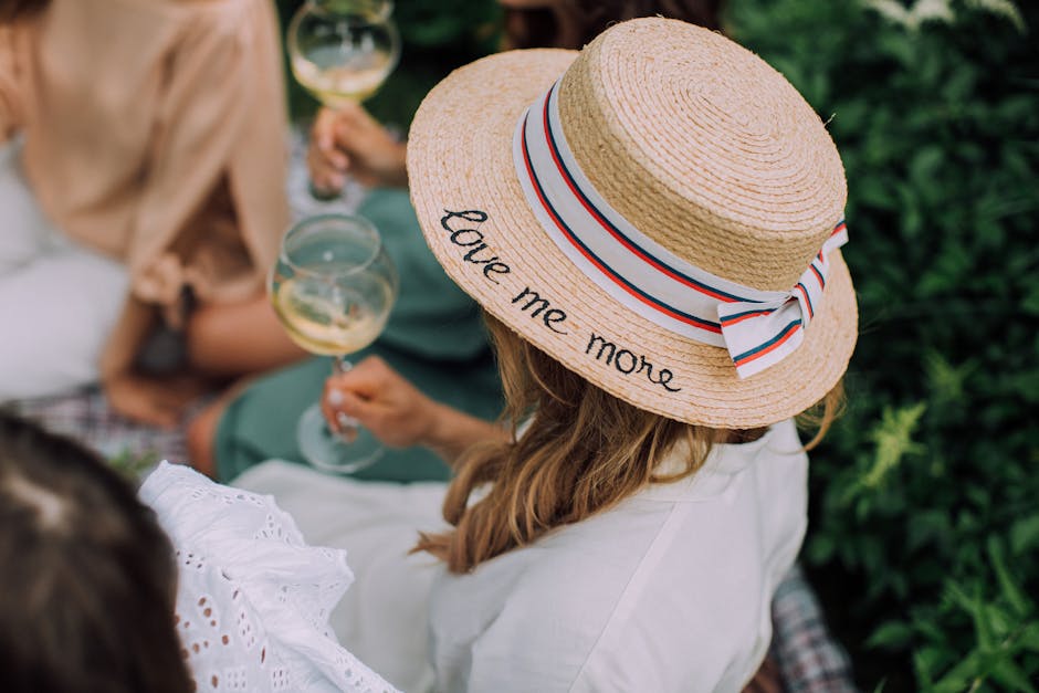 Man and woman in classic Polo Ralph Lauren summer outfits at a sunny British garden party