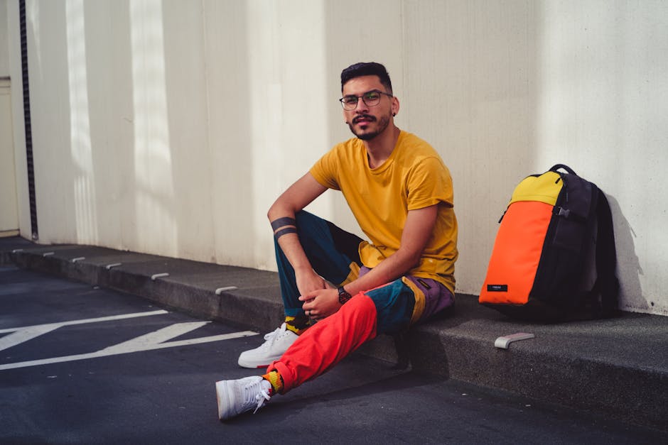Woman wearing bright summer colours against a sunny backdrop, showcasing summer 2026 fashion trends