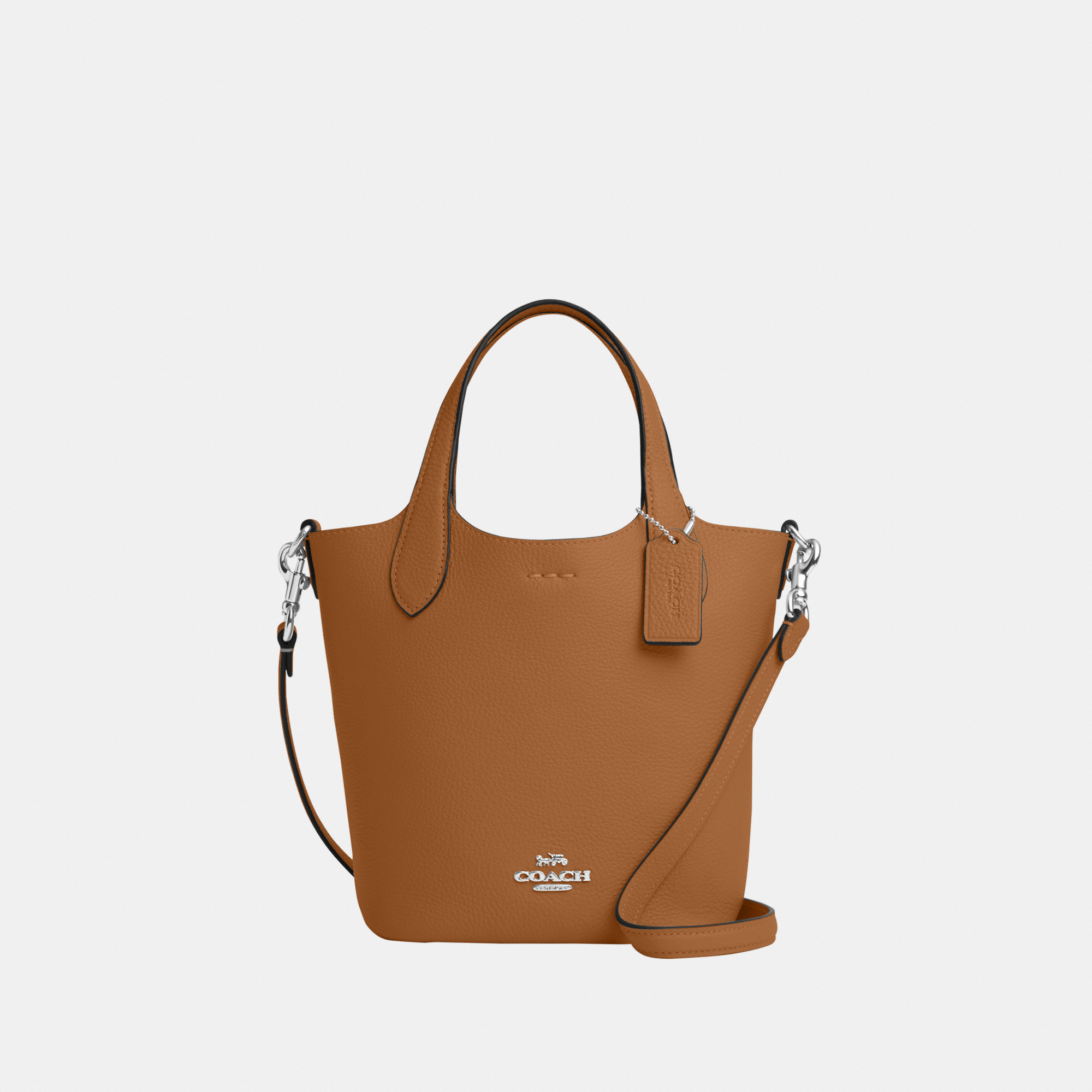 Crossbody dufflette in refined leather shop