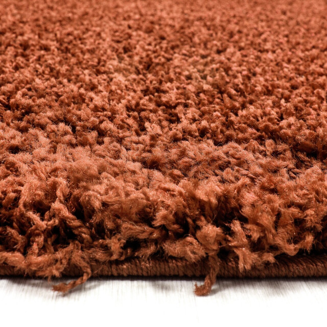 Muratap Basic shaggy vloerkleed terra / oranje hoogpolig- 100x200 cm