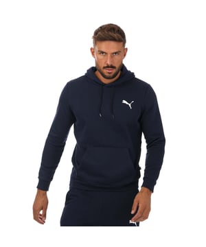 Mens Puma Essentials Small Logo Hoody in navy.- Drawstring hood.- Kangaroo pockets.- Puma logo on the chest.- Ribbed cuffs and hem.- Shell: 66% Cotton  34% Polyester. Rib: 97% Cotton  3% Elastane.- Ref.: 58669076