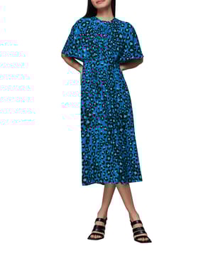 Step out in sustainable style with our 'Painted Leopard Midi Dress', perfect for adding a splash of colour and pattern to your day. Whether enjoying leisure time or dressing up for a casual outing, this eco-conscious piece with its tie neck and comfortable fit brings an effortless flair to any wardrobe.