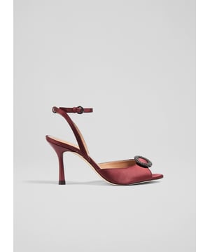 An elegant and timeless take on a party sandal, our Belle sandals have a glamorous, vintage feel. Crafted from lustrous burgundy satin, they're a peeptoe style with a sparkling, oval-shaped crystal buckle embellishment, a delicate ankle strap and a shapely stiletto heel. Wear them with your favourite party dresses or to instantly dress up a pair of tailored trousers.