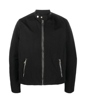 Diesel schwarze Jacke, zentraler Reißverschluss, Vordertaschen, schlichter schwarzer Mantel. Material: 78 % Polyamid, 22 % Baumwolle, schwarzer Mantel