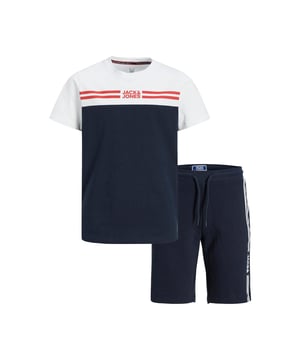 Jack & Jones tee & short set comes with a regular fit, A comfy blend with a composition of 100% cotton, The tee & shorts won't get saggy, And it's machine washable at 40°C under a gentle wash program, The tee & shorts are a regular fit and ease around your body, The fabric is all skin-friendly & gives you air circulation support over your body & legs

Features:
A pair of tee & shorts
Drawstring at waist
Elasticated waist
Comfy cotton blend
They don’t get saggy

Specifications:
Type: Tee & Shorts
Material: 100% Cotton
Product Code: 12208850

Washing Instructions:
Machine wash at max 40°C under gentle wash program
Do not bleach
Tumble dry on low heat settings
Iron on medium heat settings
Do not dry clean

Package Includes: Jack & Jones Tee & Shorts set pk for Junior