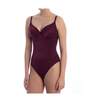 A sophisticated and functional design defines this women's shaping bodysuit, ideal for stylizing the figure with an elegant touch. Its underwire cups and floral details add a feminine touch while providing a secure and comfortable fit.


 Characteristics:

 - Made of high-quality shaping fabric that stylizes the silhouette and enhances the figure.
 - Underwired cups with light padding that provide support and enhancement to the bust.
 - Adjustable straps.
 - Soft and breathable materials, ensuring freshness and comfort all day long.
 - Front detail with floral texture in the abdominal area.
 - Smooth back design with full coverage for a smoothing effect and no marks under clothing.

 This women's underwire bodysuit is perfect for those looking for a shapewear garment that combines style and functionality, ideal for wearing under tight-fitting clothing or as part of a sophisticated look.
 Composition: 56% Polyamide, 31% Polyester, 13% Elastane
 Care:
Wash at maximum temperature 30º.
 Do not iron.
 Do not use bleach.
 Do not tumble dry.
 Do not dry clean.