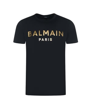 Balmain Paris Gold Brand Logo Black T-Shirt. Look your best while staying comfortable with this stylish Balmain Black T-shirt. Crafted from high-quality fabric, this piece flaunts a classic crew-neck design and decorated with the iconic Balmain Paris logo bold on the chest. Dare to stand out!. 100% Cotton, Branded Logo. Made In Italy, Slim Fit,. Crew Neck, Short Sleeve. Style: AH1EF000BB29 EAD