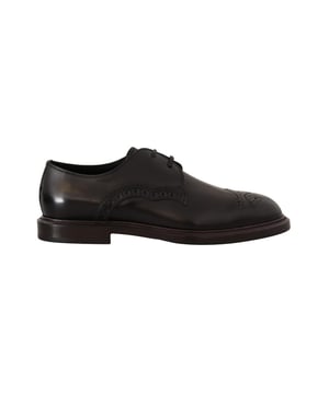 Model: Dress derby shoes
  Color: Black
  Material: 100% Calfskin Leather
  Rubber sole
  Logo details
  Made in Italy
  Very exclusive and high craftsmanship