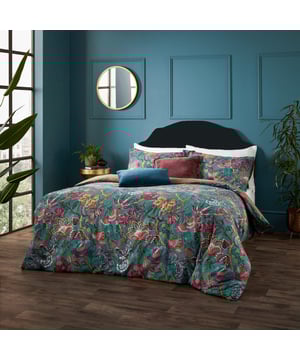 This exotic contemporary floral, inspired by the arts and crafts movement, captures an essence of escapism and mystique. Blending a rich palette of colours with intriguing flowers, patterns, and shapes perfectly encapsulates the essence of Wylder Tropics. Complete with a spotted tonal reverse, providing you with two distinct looks for a midweek refresh. This duvet cover is printed on a soft cotton-rich fabric with a textured slub finish, giving it a relaxed look that will last.