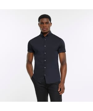 RI branding, Muscle fit, Collar neck, Short sleeve, Button fastening, Our model wears a UK M and is 185.5cm/6'1'' tall, 2 for £35 / €45 / $70 / 499 SEK, Cool Iron, Do Not Bleach, Do Not Dry Clean, Do Not Tumble Dry, Machine Wash 40oC Gentle
