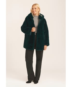 This hooded jacket is the ultimate style staple this season. Featuring a faux fur material, a hood and hook/eye style fastening, this is an easy shrug on jacket perfect for chilly days when you need a ultra-warm layer. Pair it up with casual bottoms and fresh kicks for a chic off-duty look.