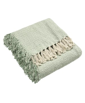 A classic herringbone weave makes the Jasper cotton throw a real crowd pleaser, whilst the double fringe and tassel edges gives a unique look. Perfect for cool summer evenings, or for layering up and adding texture to your home.
