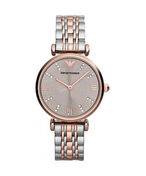 This Emporio Armani Gianni T-bar Analogue Watch for Women is the perfect timepiece to wear or to gift. It's Rose Gold 32 mm Round case combined with the comfortable Multicolour Stainless steel watch band will ensure you enjoy this stunning timepiece without any compromise. Operated by a high quality Quartz movement and water resistant to 3 bars, your watch will keep ticking. Classic and charming  watch perfect for every lady who likes to be the centre of attention. High quality 19 cm length and 14 mm width Multicolour Stainless steel strap with a Deployment clasp Case diameter: 32 mm,case thickness: 7 mm, case colour: Rose Gold and dial colour: Champagne