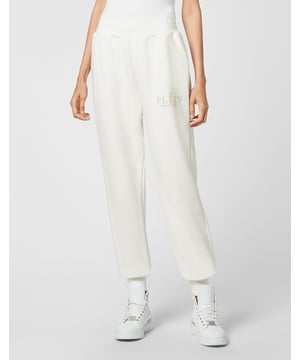 Katoenen fleece joggers met de merkopdruk op de linkerpijp. Twee paspelzakken. Tailleband met trekkoord. Ribzomen.