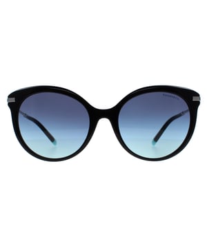 Las gafas de sol Tiffany TF4189 80019S con degradado azur negro son un diseño de moda fabricado en acetato de alta calidad. Estas gafas de sol son ligeras y duraderas, por lo que son cómodas de llevar durante largos periodos de tiempo. El logotipo de la firma Tiffany & Co adorna las puntas de las patillas de estas gafas de sol, añadiendo un toque de elegancia y sofisticación al diseño.