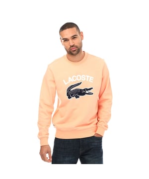 Men's Lacoste Crocodile Print Crew Neck Sweatshirt- Classic fit  natural ease:- Crew neck:- Lacoste lettering and oversised crocodile on front: - Embroidered crocodile on bottom: - Unbrushed cotton fleece: