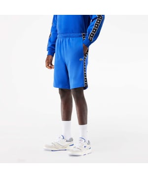 Drawcord on elastic waist.Stripe and crocodile feature down legs.Embroidered crocodile on front.Brushed fleece.Regular fit  straight cut.