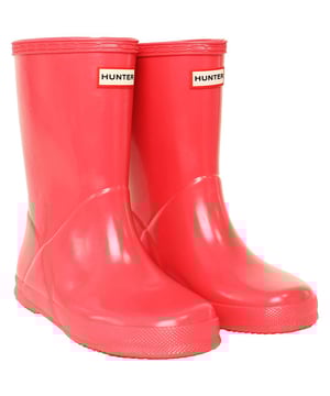 Let your child make a splash in style with the Hunter Gloss Kids Pink Wellington Boots. These boots are a miniature version of the iconic adult style, offering the perfect blend of functionality and fashion. The glossy finish adds a touch of sophistication to the classic design, making them a must-have for every young trendsetter.

Key Features:

 Glossy Finish:  The standout feature of these boots is the glossy exterior, adding a chic and stylish element to the classic Wellington design. The shiny pink hue makes these boots a fun and fashionable choice for rainy days.

 Durable and Waterproof:   Crafted from high-quality rubber, these boots are built to withstand the elements. The waterproof construction ensures that your child's feet stay dry and comfortable, making them suitable for various outdoor activities.

 Comfortable Interior:   Designed for all-day wear, the boots feature a comfortable interior with a cushioned insole. Your child can enjoy extended playtime without sacrificing comfort, making these boots ideal for both casual outings and outdoor adventures.

 Easy to Wear:   The pull-on style and adjustable strap make these boots easy for kids to put on and take off independently. The wide opening and pull tabs enhance convenience, allowing for hassle-free dressing.

 Sturdy Grip:   The slip-resistant sole provides excellent traction on different surfaces, ensuring stability in wet and slippery conditions. These boots are designed to keep your child sure-footed while exploring the outdoors.

 Reflective Logo:   For added safety, the boots feature a reflective Hunter logo. This detail enhances visibility in low-light conditions, making them a practical choice for early morning or evening activities.

 Iconic Branding:   Showcasing the iconic Hunter logo on the front, these boots maintain the brand's reputation for quality and style. The pink color adds a playful touch, making them a versatile and eye-catching accessory.

Elevate your child's rainy-day wardrobe with the Hunter Gloss Kids Pink Wellington Boots â€“ a perfect combination of style, durability, and functionality that brings a pop of color to outdoor play.