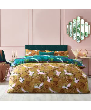 Glide through the air with the majestic birds soaring through tropical foliage in this vibrant reversible duvet set. The reverse features a complimenting colour with matching design for an alternative look when you need it.