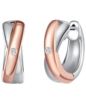 With these adorable ear screoles from Rafaela Donata, the symbol of eternal love is shown in a modern robe. The visible part of the creoles made of the finest 925 sterling silver consists of two crossed ribbons, one of which has been refined with delicate rose gilding and which, on closer inspection, form the typical infinity motif. In the middle, where both silver strands meet, a carefully ground diamond was embedded, which tastefully completes the ensemble. And thanks to the sophisticated folding mechanism, it is easy to create these treasures.