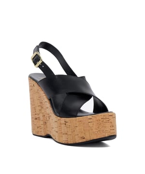Step out in style this spring/summer and meet Kaiden: statement wedge sandals that will take your look to the next level. Made from premium leather and designed with a very high heel, this open-toe design features a secure and comfy buckle fastening.