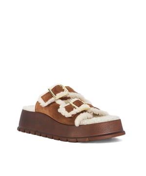 The ultimate off-duty style to take you on the coffee run or to the gym, our Lazio double strap sandals have the added benefit of a faux shearling-lined insole for added comfort. Designed with two adjustable gold buckles with our signature branding the addition of the light-weight track sole makes these the perfect addition to your weekend wardrobe.
