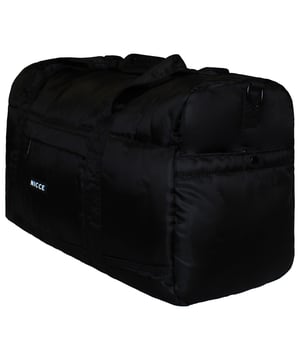 Keep your essentials organized and elevate your accessories collection with the Nicce Expo Barrel Men's Black Bag. With a sleek, versatile design and ample storage space, this bag is perfect for gym sessions, weekend getaways, or daily commutes.
 
Key Features:
Barrel Shape Design: 

The classic barrel shape offers a spacious interior, making it ideal for carrying gym gear, travel items, or everyday essentials in a stylish and compact manner.

Durable Construction: 

Made from high-quality, sturdy materials, this bag is designed to withstand regular use while keeping your belongings protected.

Spacious Main Compartment: 

The large main compartment provides ample room for clothes, shoes, and other necessities, making it easy to pack for short trips or gym sessions.

Zipped Side Pocket: 

Includes an external zipped side pocket for quick access to smaller items like keys, phone, or wallet, keeping them safe and separate from the main compartment.

Adjustable Shoulder Strap: 

Features an adjustable and detachable shoulder strap for comfortable carrying options. You can wear it across your body, over your shoulder, or use the dual carry handles for convenience.

Nicce Branding: 

Subtle Nicce logo detailing on the side of the bag adds a touch of sophistication and makes it a stylish option for those who appreciate understated branding.

Compact and Lightweight: 

The lightweight construction makes it easy to carry around, whether you’re heading to the gym, traveling, or running errands.

Versatile Black Color: 

The neutral black color ensures it complements various outfits and settings, making it a versatile addition to your accessories collection.

Easy to Store and Pack: 

The flexible structure allows the bag to be folded or compressed for easy storage when not in use.

 
With its combination of practicality and modern design, the Nicce Expo Barrel Men's Black Bag is perfect for anyone looking for a reliable and stylish way to carry their essentials, making it an ideal choice for active lifestyles or weekend adventures.