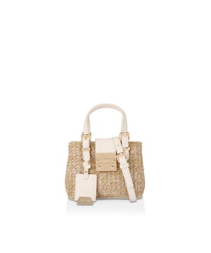 The Carvela Mini Mandy bag features a neutral woven raffia exterior. The top handles and strap closure are both accented with gold tone hardware. There is a black luggage tag on the top handles. 14cm (H), 17cm (W), 9cm (D). Strap length: 121cm.