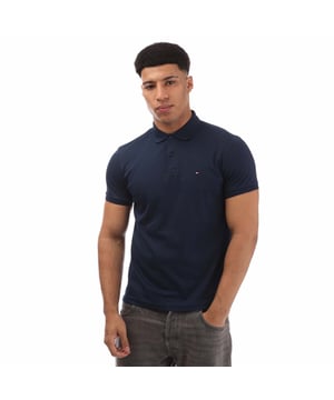Mens Tommy Hilfiger Regular-Fit Polo Shirt in blue.- Polo collar.- Short-sleeved.- Two-button placket.- Tommy Hilfiger branding.- Tommy Hilfiger flag embroidery on chest.- Regular fit.- Ref: MW0MW35585DAF