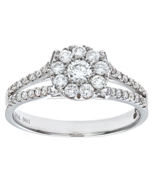 18K (750) geel- en witgoud: 4 gram; # Diamant: 0,6 ct