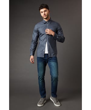 Slim fit design for a modern, tailored silhouette
        Dark vintage wash adds a classic, lived-in look
        Stretch fabric for enhanced comfort and mobility
        Five-pocket styling for practicality and authenticity
        Versatile dark hue perfect for various casual ensembles
    
    These Burton Dark Vintage Wash Stretch Slim Fit Jeans are the epitome of casual sophistication. The slim fit design creates a sleek, contemporary silhouette that flatters the modern man's physique. The dark vintage wash lends these jeans a timeless appeal, perfect for the gent who appreciates classic style with a subtle edge. Ideal for a variety of casual occasions, from laid-back pub nights to relaxed family gatherings, these jeans offer both style and comfort. Pair them with a crisp button-down shirt and trainers for a smart-casual look, or dress them down with a simple white tee and canvas shoes for effortless weekend style. The stretch fabric ensures all-day comfort, whether you're cheering on your favourite team at the local or enjoying a casual stroll in the park. These versatile jeans are a must-have staple for the discerning 30-something who values both style and practicality in his wardrobe.