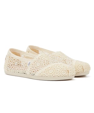 Experience ultimate comfort and style with our exquisite crochet uppers, complemented by the cutting-edge TOMS CloudBound Sole. Crafted to provide exceptional comfort, cushioning, and traction, these shoes are a true delight for your feet. The textile upper is not only trendy but also 100% vegan, making it a perfect choice for conscious consumers. With a removable insole and elastic gore for effortless on-and-off, these shoes are designed to enhance your convenience. Step into a world of comfort and sustainability with our remarkable footwear.