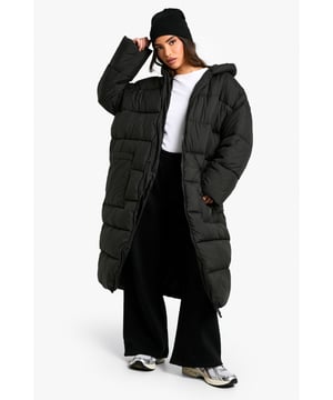 Keep toasty this season with our collection of petite coats and jackets. From petite trench coats to petite teddy coats, our coats for petite women are specifically designed to fit all you girls sitting pretty at 5'3'' and under. Step out in a petite blazer or pass the vibe check in a petite puffer jacket. Whatever your style, we've got you, girl. This one would look dreamy with a pair of straight leg jeans, an oversized hoodie and chunky trainers.Style: Puffer JacketFabric: PolyesterLength: LonglineNeckline: HoodedSleeve Length: Long Sleeve