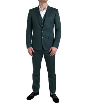 100% Authentic Dolce & Gabbana suit
  Emerald Green color
  MARTINI collection
  Slim fit design
  Two-button closure blazer
  One open vent in the back of the blazer
  3-way zipper closure pants
  Two inside pockets in the pants
  Made in Italy
  High craftsmanship
  Exclusive materials: 46% Cotton 29% Silk and 25% Polyester
  Lining: 48% Viscose 34% Acetate and 18% Cupro
Material: 46% Cotton 29% Silk 25% Polyester