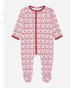 Magnolia Baby depict high quality and precision of beauty in their Pima cotton aesthetics. This unisex baby isle red pyjama romper captures the label's passion for traditional designs with an innovative twist. Made with reindeer/snowflake patterning and ribbed trims for a festive finish.  Top: Crew Neck  Reindeer/Snowflake Patterning  Ribbed Trims  Pima Cotton  Press Stud Fastening  Brand Tag