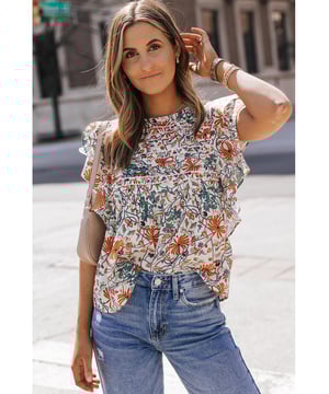 Estampado floral vintage multicolor  
Diseño sin mangas con detalles de fruncido en las mangas  
Fabricado con materiales de calidad  
Estilo atemporal y femenino  
Versátil para uso diario o ocasiones especiales