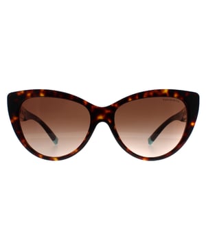Tiffany TF4196 80153B havana gradiente marrón gafas de sol son un diseño moderno hecho de acetato de alta calidad, estas gafas de sol son a la vez ligero y duradero, por lo que son cómodos de usar durante largos períodos. El emblema de la cadena de la firma Tiffany & Co adorna las patillas de estas gafas de sol, añadiendo un toque de elegancia y sofisticación al diseño.