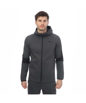 Mens Puma Evostripe Cure Full Zip Hoodie in grey heather.- Hood with drawcords.- Full-zip closure.- Raglan sleeves.- Front zip pockets.- Rounded  dropped back hem.- Reflective PUMA logo.- Slim fit.- 100% Cotton.- Ref: 58581207