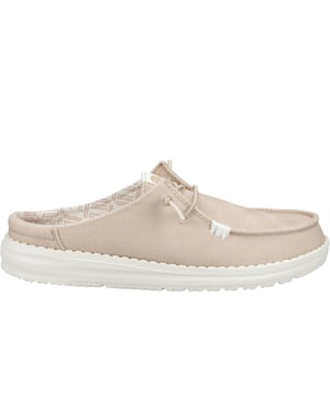 The Hey Dude Wendy Classic Mule is the ultimate in easy-going style, blending all-day comfort with eye-catching patterns and versatile colours to suit any look. Made with a soft textile upper and a supportive raised back heel, this shoe provides a secure yet relaxed fit. The elasticated laces make slipping it on a breeze, while the lightweight, flexible outsole offers responsive support with every step. Complete with a removable foam insole for customizable cushioning, the Wendy Slip Classic Mule is designed to be your go-to for effortless style and unbeatable comfort all day long.
 - Textile upper 
 - Raised back heel 
 - Elasticated laces 
 - Removable foam insole 
 - Flexible outsole