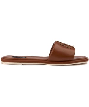 De Vegan Choy Logo Slides van V.gan belichamen ethische chic met een trendy vierkante neus en 100% veganistische kenmerken. Deze stijlvolle, lichtbruine sandalen zijn vervaardigd in een veganistisch-gecertificeerde fabriek en hebben een strak bovenwerk en een comfortabele rubberen zool. Omarm de toekomst van mode en voeg wat pit toe met het door PETA goedgekeurde, milieubewuste basisstuk, geleverd in gerecyclede verpakkingen. Doe wat je zegt en laat de aandacht trekken bij elke milieuvriendelijke stap.