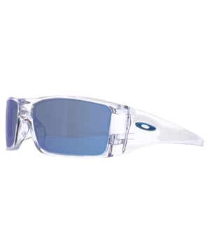 Oakley Wrap Unisex Clear Prizm Sapphire Polarized Heliostat  Sunglasses Discover the Oakley Heliostat sunglasses, crafted to deliver both high-performance and all-day comfort. These unisex sunglasses feature Oakley's Prizm lens technology, which sharpens colors, contrasts, and details for an enhanced, crystal-clear view of your surroundings. Designed with O-Matter frame material, they are lightweight yet incredibly durable, ensuring long-lasting wear without sacrificing comfort. The molded-in nose pads provide a secure fit that stays in place, while the sleek frame contours effortlessly to your face for a snug, all-day comfort experience. Whether you're tackling outdoor sports or simply enjoying the sun, the Oakley Heliostat combines style and innovation for any adventure.