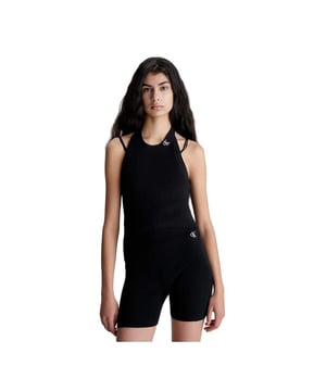 Calvin Klein authentisches Damen Top Schwarz Baumwolle. Authentisches Kleidungsstück der Marke Calvin Klein - Streetwear/Sportswear-Design von Calvin Klein - Calvin Klein für Frauen, modisch und perfekt für den Alltag - Das schwarze Calvin Klein Top lässt sich hervorragend mit dem Rest Ihrer Garderobe kombinieren - bequeme Baumwollqualität - klassisch - authentisch -
