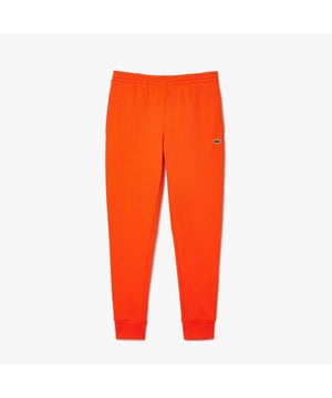 Heren Lacoste Organic Cotton Fleece Trackpants.- Slanke pasvorm, aangepast model: Comfortabel. Lichtgewicht.- Koord en geribde enkels: Een verstelbare tailleband voor comfort op maat.- Geborduurde krokodil op de voorkant genaaid: Handtekening Lacoste.- Geborsteld biologisch katoen fleece: Respecteert de planeet.
