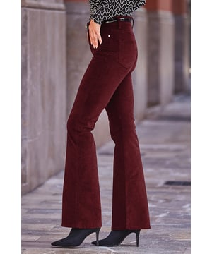 The jeans you never knew you neededKick flare cut makes your legs look so longPlush velvet fabric feels amazingLuxurious wine hueGo cosy with a chunky knit and bootsTake them out-out with strappies and a sparkly topInside leg to fit: Short 29" | Regular 31" | Long 33"